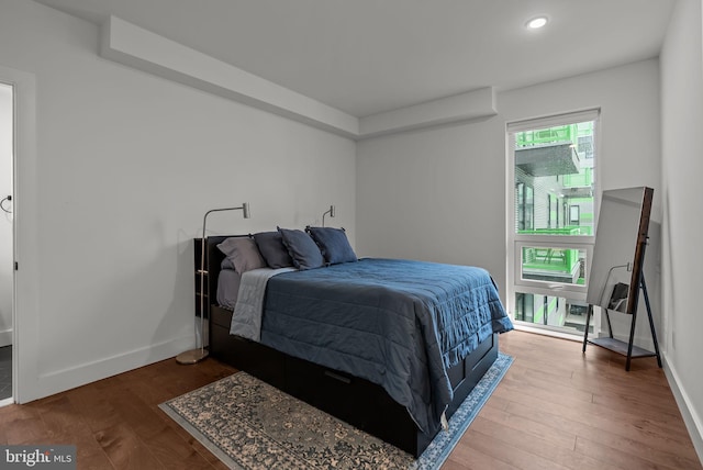 1501 N 31st St Unit 318, Philadelphia, PA 19121 - bedroom with baseboards, recessed lighting, and wood finished floors