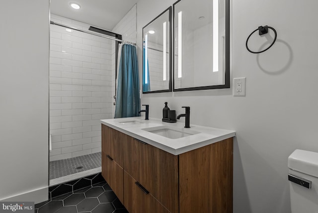 1501 N 31st St Unit 318, Philadelphia, PA 19121 - bathroom with a sink, a tile shower, tile patterned flooring, and toilet
