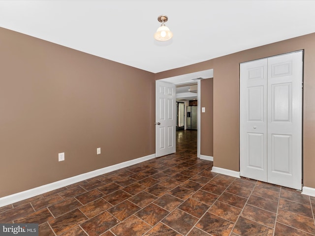 19512 Desmet Pl, Montgomery Village, MD 20886 - unfurnished bedroom with baseboards and a closet