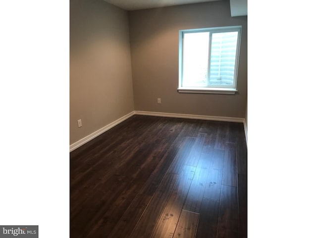 1315 N 6th St, Philadelphia, PA 19122 - unfurnished room with baseboards and dark wood finished floors