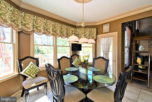 dining area featuring crown molding and light tile patterned flooring