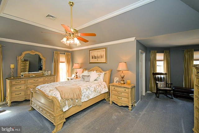 bedroom featuring dark carpet, crown molding, ceiling fan, and visible vents