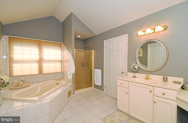 full bath featuring a bath, vanity, tile patterned floors, a stall shower, and lofted ceiling