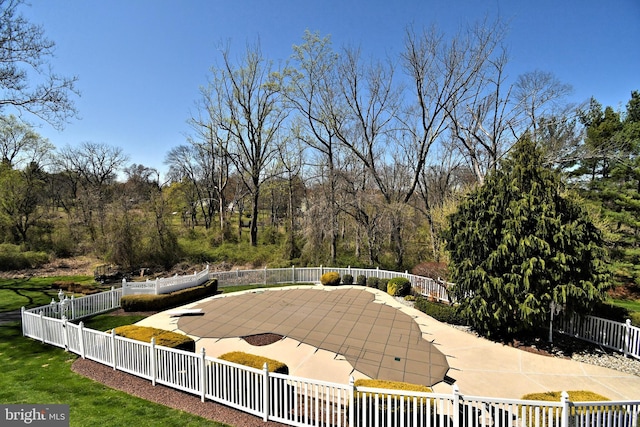 view of patio with fence