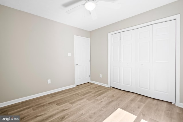 804 Farms River Rd, Front Royal, VA 22630 - unfurnished bedroom with wood finished floors, baseboards, a closet, and a ceiling fan