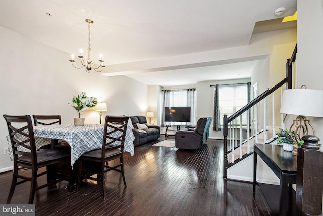 dining area with an inviting chandelier, stairway, baseboards, and hardwood / wood-style floors