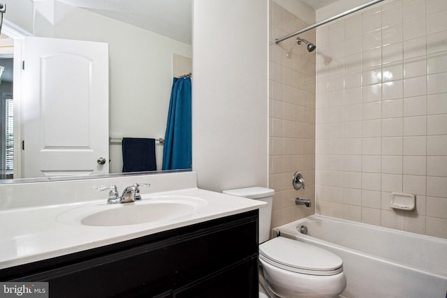full bath featuring toilet, shower / tub combo, and vanity