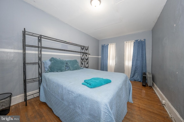 4990 W Thompson St, Philadelphia, PA 19131 - bedroom featuring baseboards and wood finished floors