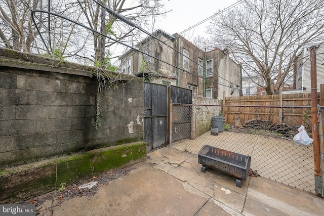 4990 W Thompson St, Philadelphia, PA 19131 - view of patio featuring fence and a gate