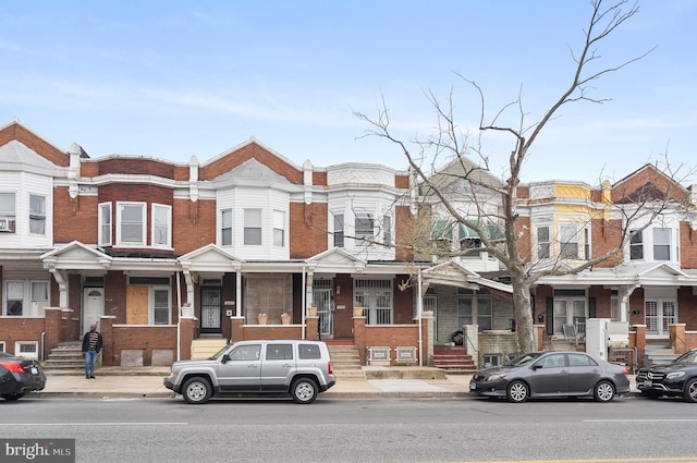 multi unit property featuring brick siding