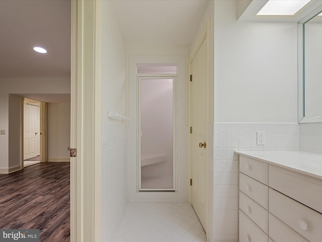 1324 Ramseur Ln, Winchester, VA 22601 - bathroom with wood finished floors, vanity, and recessed lighting