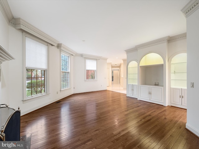 1324 Ramseur Ln, Winchester, VA 22601 - unfurnished living room featuring wood-type flooring, baseboards, and ornamental molding
