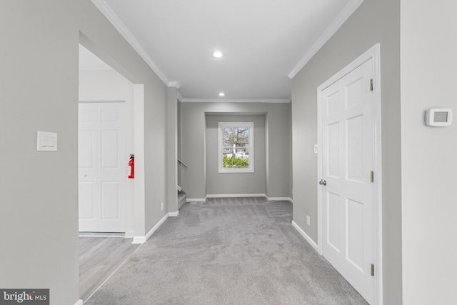 corridor featuring recessed lighting, stairs, carpet, ornamental molding, and baseboards