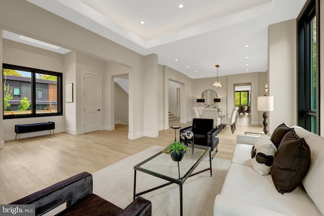 1853 Massachusetts Ave, Mclean, VA 22101 - living room with light wood-style flooring, stairway, recessed lighting, baseboards, and a tray ceiling