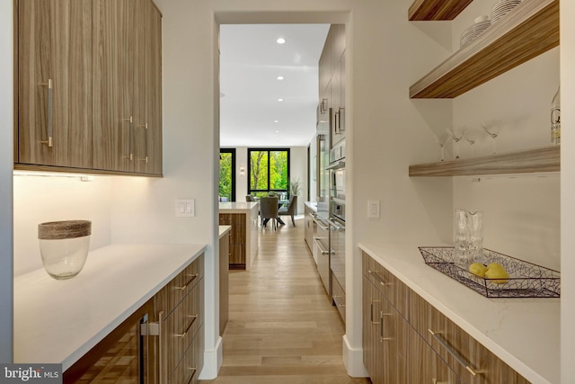 1853 Massachusetts Ave, Mclean, VA 22101 - indoor dry bar featuring light wood-type flooring, recessed lighting, and oven