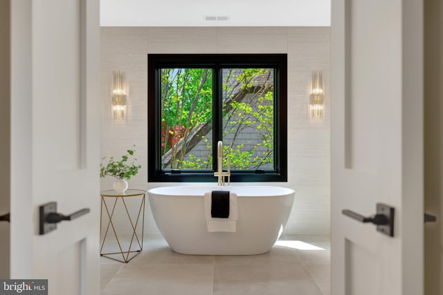 1853 Massachusetts Ave, Mclean, VA 22101 - bathroom with tile patterned floors and a freestanding tub