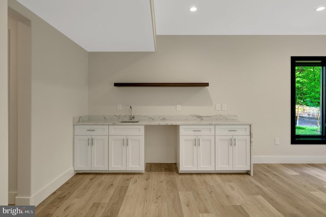 1853 Massachusetts Ave, Mclean, VA 22101 - kitchen with light wood-style flooring, white cabinets, light stone countertops, baseboards, and recessed lighting