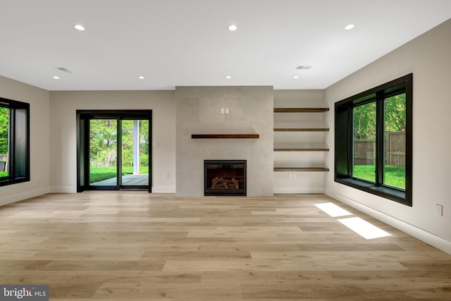 1853 Massachusetts Ave, Mclean, VA 22101 - unfurnished living room with a fireplace, light wood-type flooring, baseboards, and recessed lighting