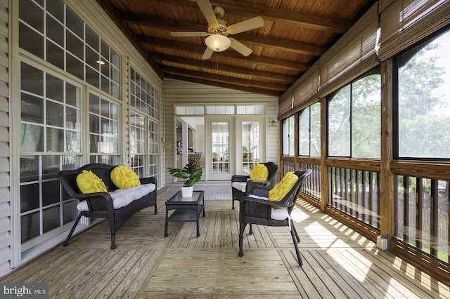 sunroom / solarium with ceiling fan and an outdoor hangout area