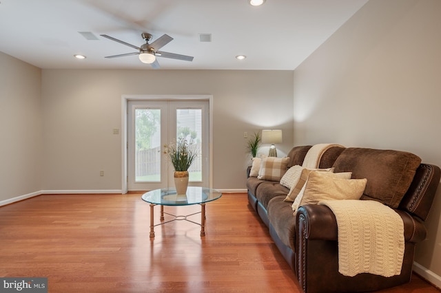 living area featuring ceiling fan, recessed lighting, wood finished floors, and baseboards