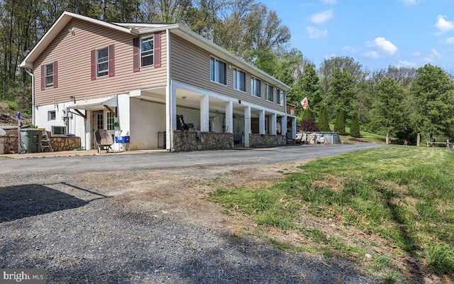 212 Mowry Ln, Edinburg, VA 22824 - view of side of property featuring covered porch and driveway