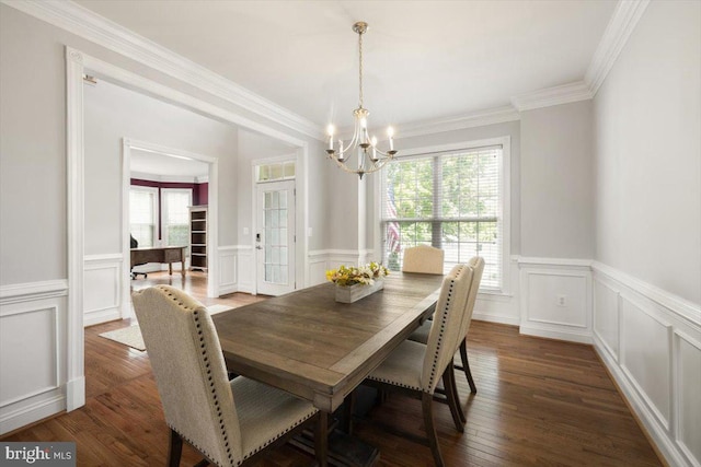 7135 Hills Ln, Warrenton, VA 20187 - dining space featuring a chandelier, plenty of natural light, wainscoting, crown molding, and wood finished floors