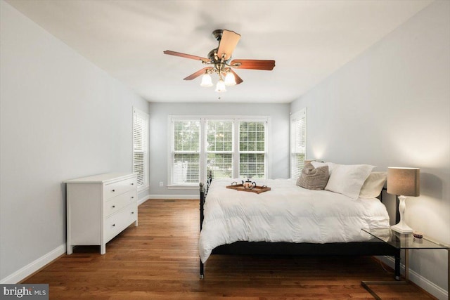 7135 Hills Ln, Warrenton, VA 20187 - bedroom with baseboards, wood finished floors, and ceiling fan