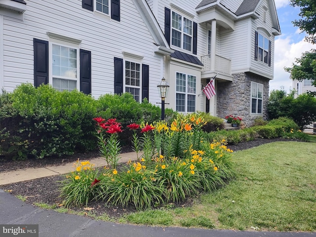 7135 Hills Ln, Warrenton, VA 20187 - view of property exterior with stone siding and a lawn