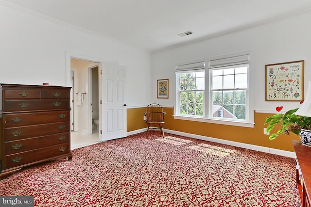 carpeted bedroom with visible vents, crown molding, and baseboards