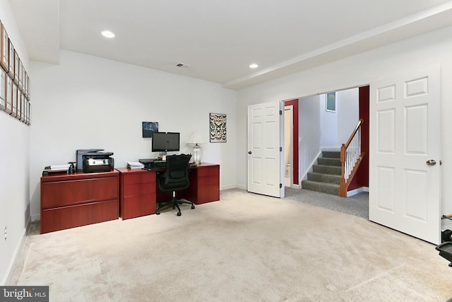 office area with visible vents, baseboards, recessed lighting, and light carpet