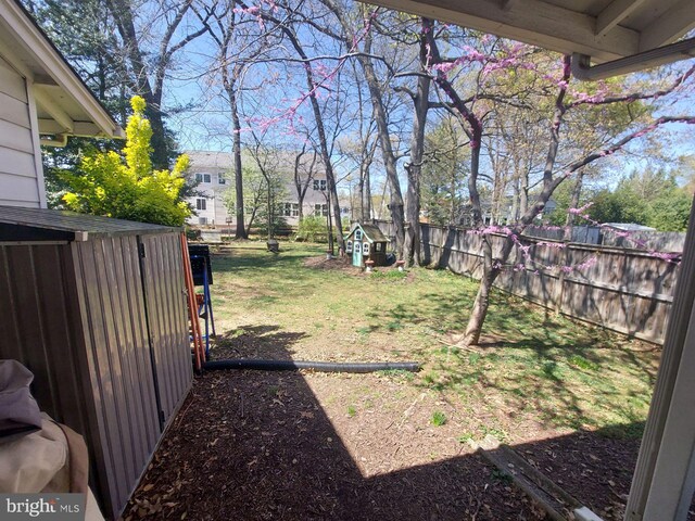 view of yard featuring a fenced backyard