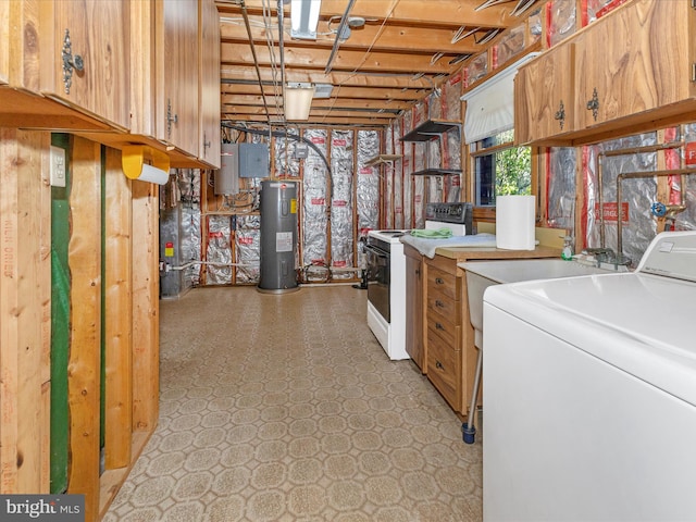 laundry area featuring laundry area, light floors, washer / clothes dryer, and electric water heater