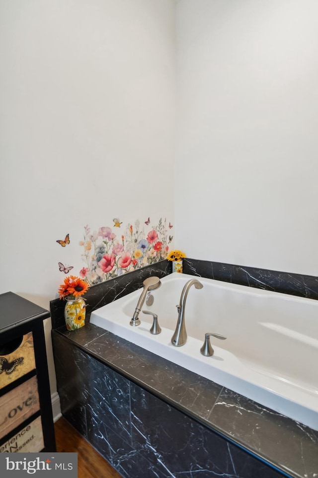 full bath with a garden tub