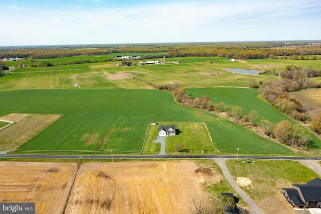 drone / aerial view with a rural view and a water view