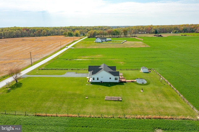 birds eye view of property featuring a rural view