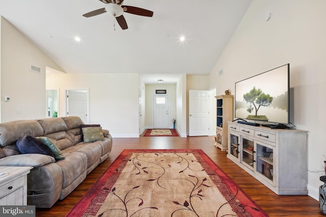 living room featuring wood finished floors, high vaulted ceiling, ceiling fan, and visible vents