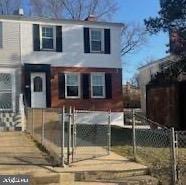 view of front of property with a fenced front yard