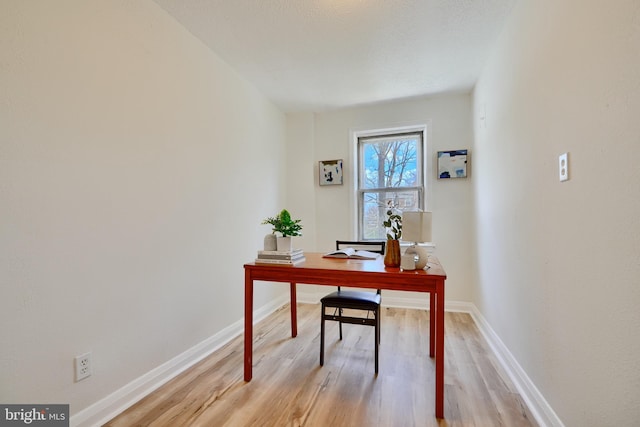 home office featuring light wood-style floors and baseboards