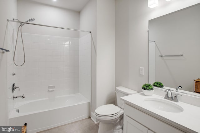 full bathroom featuring vanity, tile patterned floors, bathtub / shower combination, and toilet