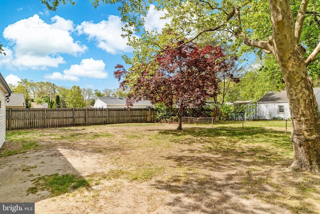 view of yard with a fenced backyard