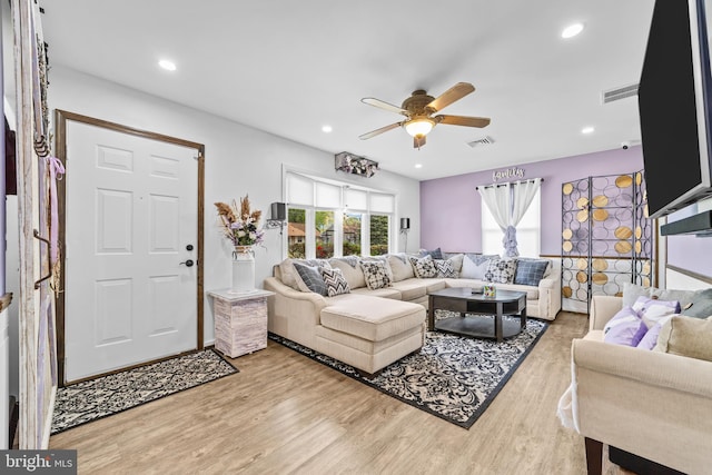 living room featuring visible vents, recessed lighting, light wood-style flooring, and ceiling fan