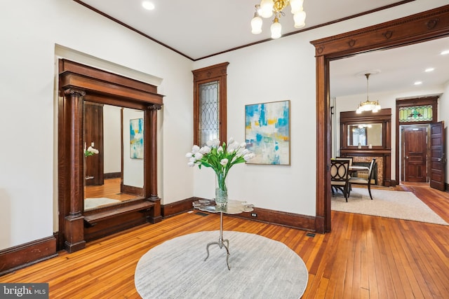 1231 Girard St NW, Washington, DC 20009 - entryway with baseboards, ornamental molding, a chandelier, recessed lighting, and hardwood / wood-style flooring