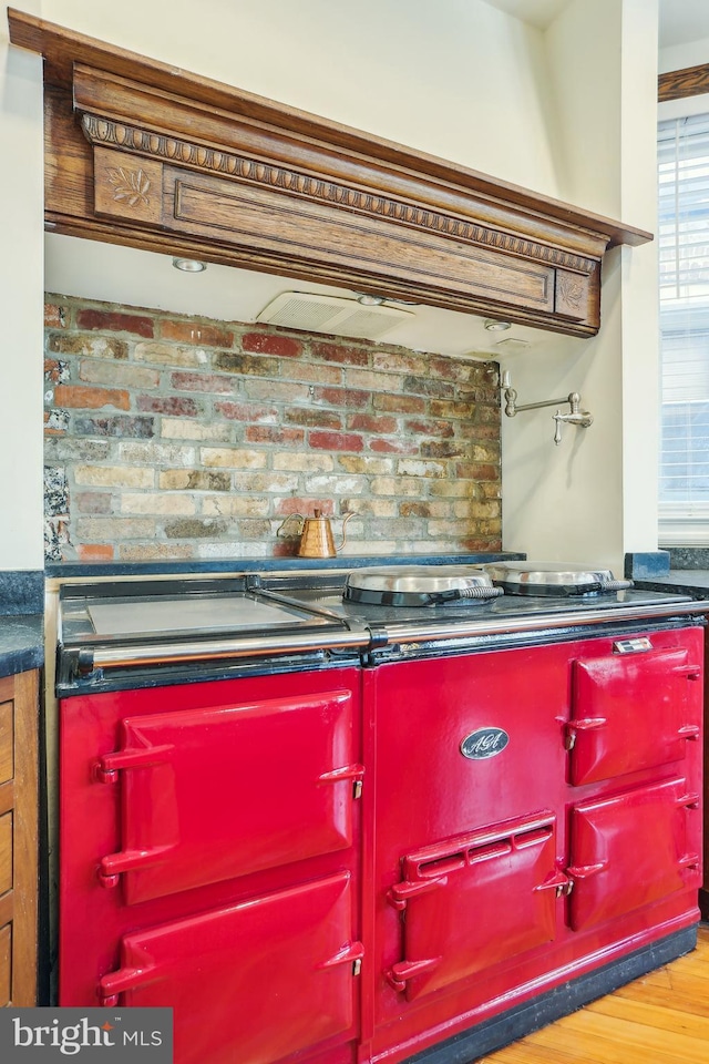 1231 Girard St NW, Washington, DC 20009 - details featuring wood finished floors and custom range hood