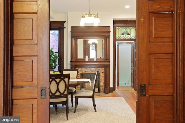 1231 Girard St NW, Washington, DC 20009 - dining room featuring a chandelier and light wood-style flooring
