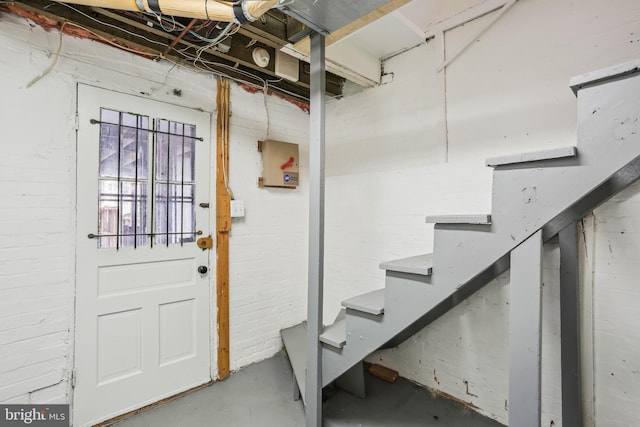 1231 Girard St NW, Washington, DC 20009 - interior space featuring stairway and brick wall