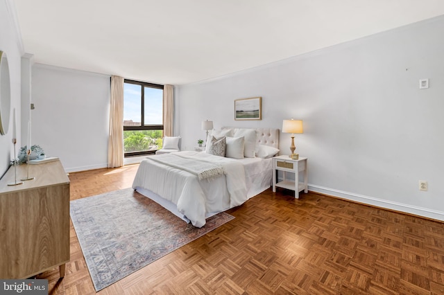 bedroom featuring baseboards
