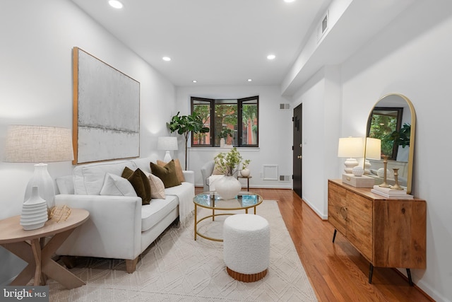 1773 Swann St NW, Washington, DC 20009 - living area with wood finished floors and recessed lighting
