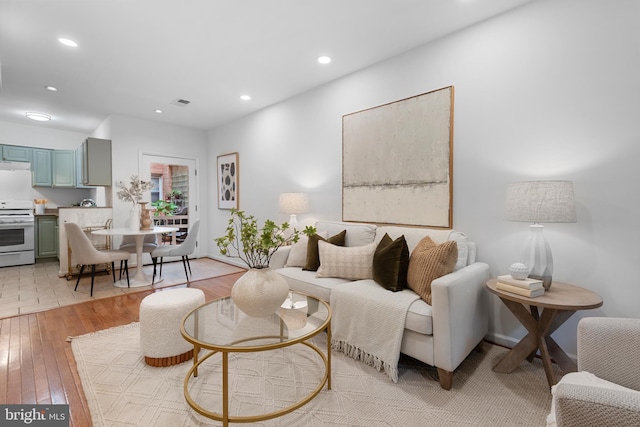 1773 Swann St NW, Washington, DC 20009 - living area featuring light wood-style floors and recessed lighting