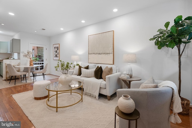 1773 Swann St NW, Washington, DC 20009 - living room featuring light wood-type flooring and recessed lighting