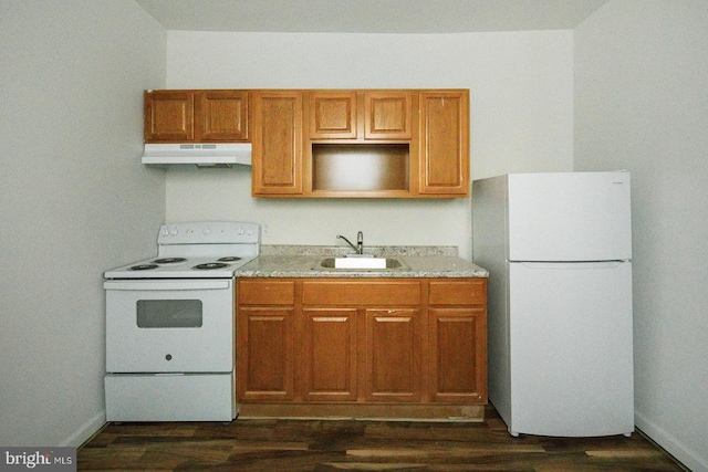 3923 Brown St, Philadelphia, PA 19104 - kitchen featuring a sink, white appliances, dark wood-style flooring, and under cabinet range hood